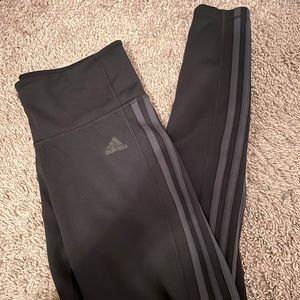 Women’s size medium black adidas yoga pants with black stripes down the leg
